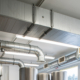 Ventilation pipe system in kitchen interior
